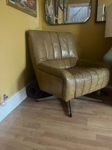 Pair of 1960's Danish Leather & Chrome Swivel Armschairs