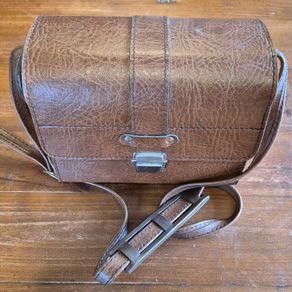 Vintage Brown Camera Case with Red Interior and Shoulder Strap