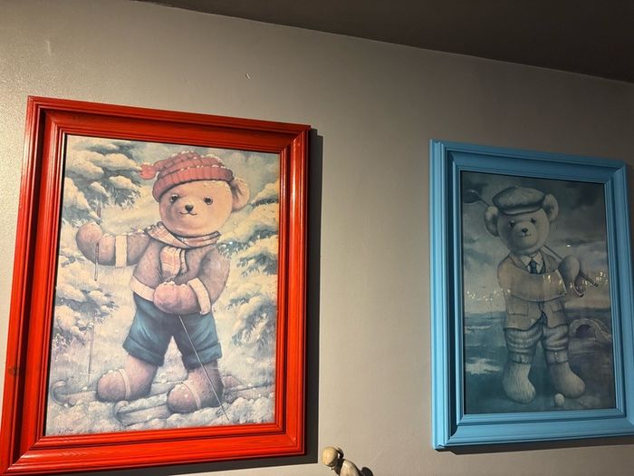 Teddy playing golf print in a blue wooden frame