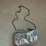 New silver mango clutch Image 3