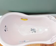 BRAND NEW baby bath , baby pink in colour