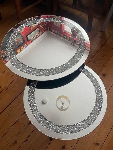 Nest of mirrored tables