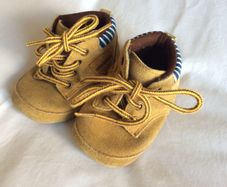 Adorable baby boots by American brand Carters 0 3 6 months)