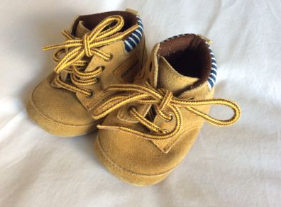 Adorable baby boots by American brand Carters 0 3 6 months)