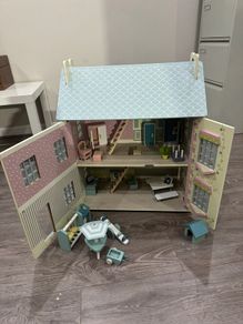 Large, detailed wooden dollhouses