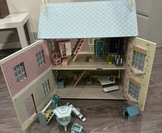 Large, detailed wooden dollhouses