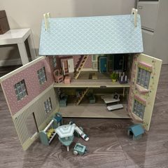 Large, detailed wooden dollhouses