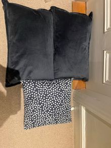 3 grey Scandi style cushions