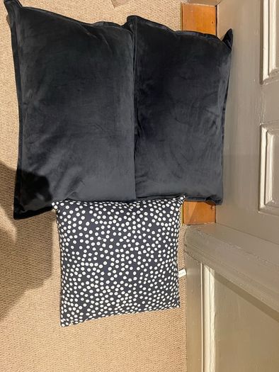 3 grey Scandi style cushions