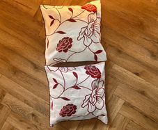 Feather filled cushions x 2