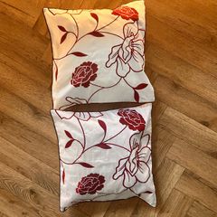 Feather filled cushions x 2