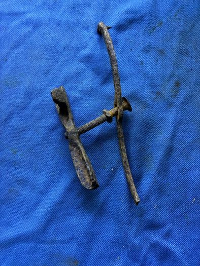 Cast iron band for end over end butter churn lid plus another misc butter churn item