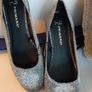 new silver bag tag attached new silver shoes Image 2