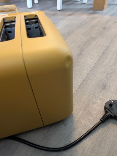 Mustard yellow 4 slice toaster and bread bin