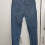 Distressed blue jeans Image 6