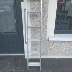 Two piece extendable ladder