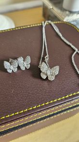 NEW - Silver butterfly necklace and stud earrings