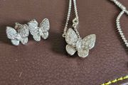 NEW - Silver butterfly necklace and stud earrings