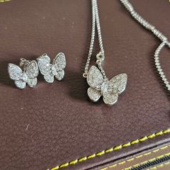 NEW - Silver butterfly necklace and stud earrings