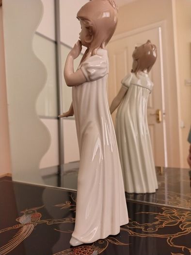 Nao by Lladro.  Yawning Girl. Damaged.