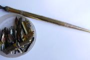 Vintage dip pen with collection of assorted nibs