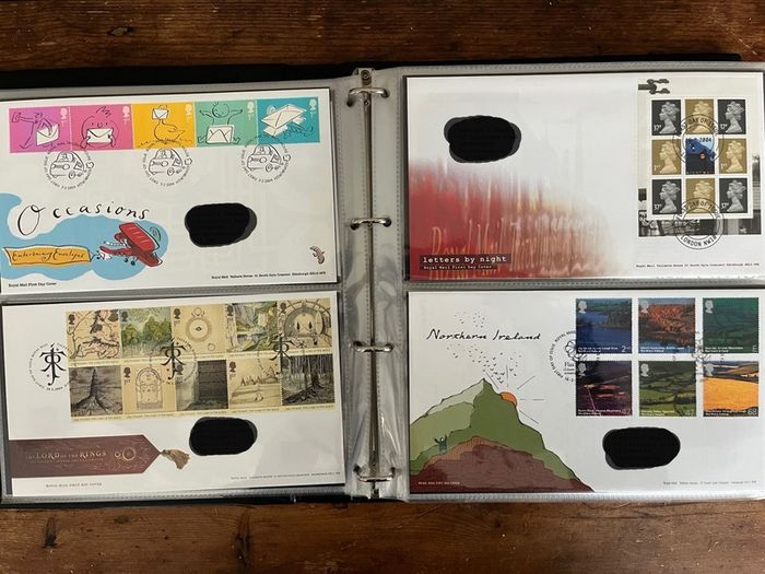 Collection of  87 UK First Day Cover stamps 2003 to 2006 in album