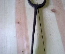 Old cooper's flagging iron