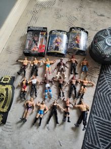 WWE figures, cage, and belt