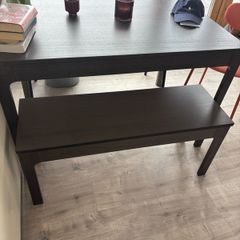 Dark wood bench