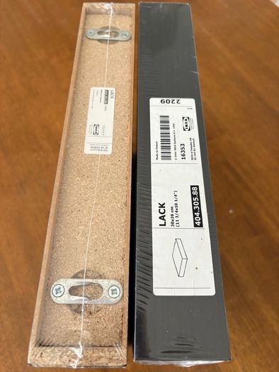 two IKEA black LACK shelves