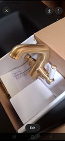 Brushed brass tap