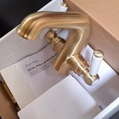 Brushed brass tap