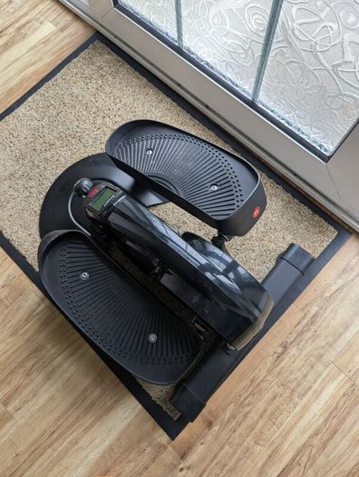YYFITT under-desk elliptical / pedal exerciser.