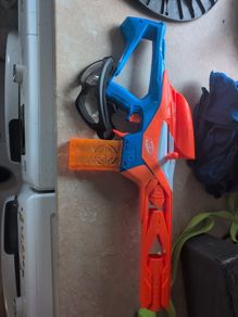 nerf gun and glasses