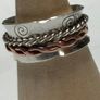 Handmade sterling silver fidget spinner ring with copper. Image 5