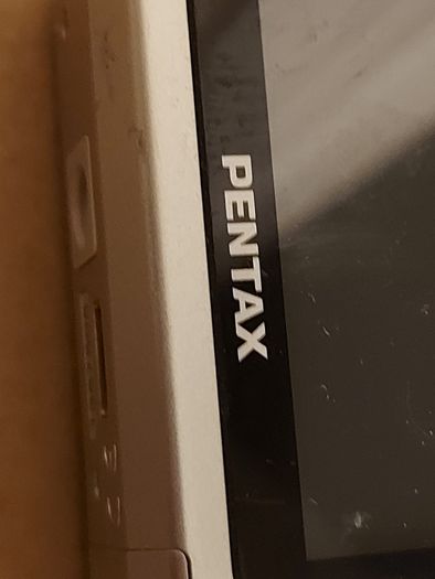 Pentax Optio E40, 8.1 megapixels, Takes 2 AA Batteries, working great and in excellent cosmetic condition
