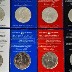 8 x USA Olympic Silver Dollars