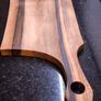 One piece of solid European Walnut, no glue, no joints. Hand-sanded and oiled with food-safe oil. Image 10