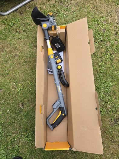 Titan grass strimmer.