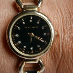 Anne Klein ladies watch - gold tone with black dial