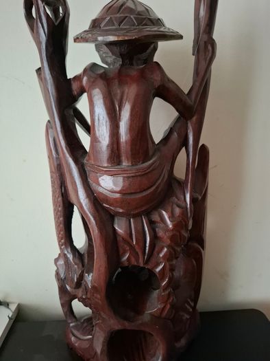 Hand carved wooden Balinese sculpture Fisherman