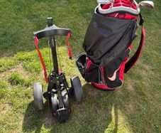 nike gold bag with trolly and clubs