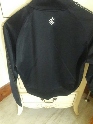 Black Rocawear zip up jacket.