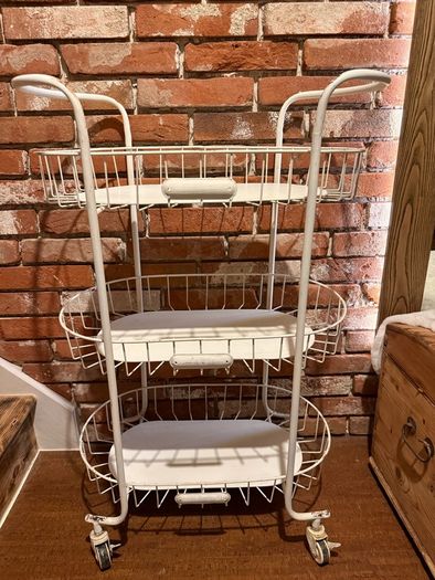 charming Iron shelf on wheels