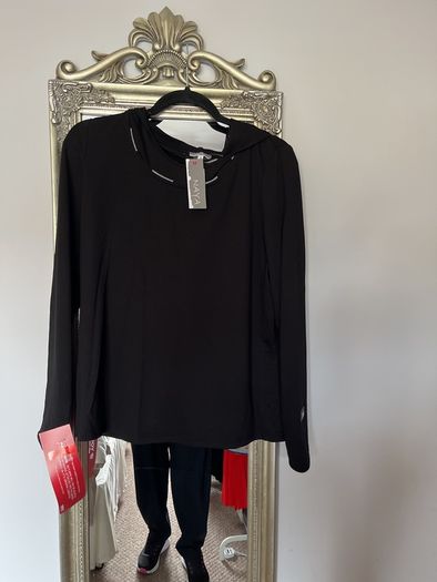 Naya black hooded top with white piping and design down back