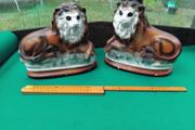 a pair of old chalk lions
