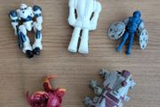 5 plastic action figures