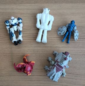 5 plastic action figures