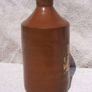 Stoneware antique ink bottle (large size 7.5" high) - made by Joseph Bourne of Denby (1880's - 1910's). Superb condition with remnants of label. Image 4