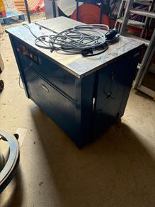 Box strapper machine
